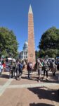A view of numerous protestors in front of the Colorado Capitol.